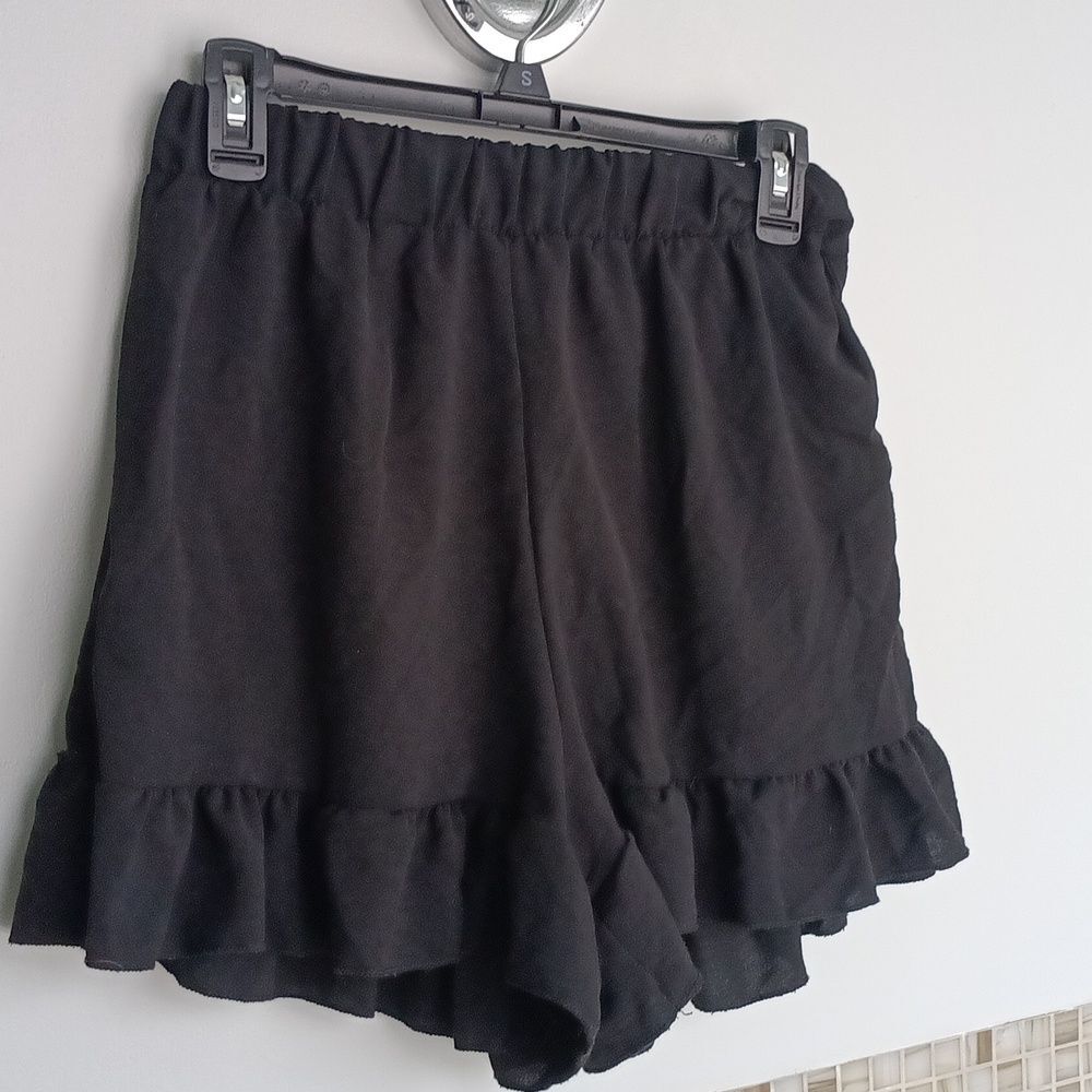 Chic Black Ruffle Mini Skirt - Picture 3 of 4